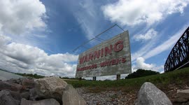 Beautiful Timelapse Of A Sign Warning Of Extreme Danger Of Rising Water Suddenly At Kentucky Dam
