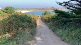 Walk down to the sand bar on St Agnes, Isles of Scilly