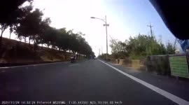 Close call: Mercedes nearly smashes into moped rider in dangerous overtaking move in Taiwan