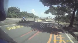 RECKLESS DRIVING: Moped rider makes an illegal u-turn on the highway (Dashcam Video)
