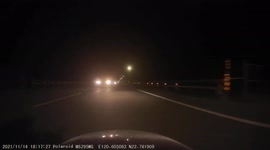 RECKLESS DRIVING: Speeding driver overtakes on the highway into oncoming traffic (Dashcam Video)