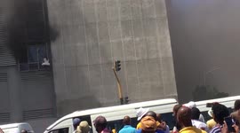 Dramatic moment shoppers climb from burning mall in South Africa