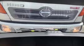 Insanely dangerous truck tailgates inches behind car on highway in Taiwan (Dashcam Video)