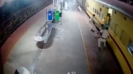Quick-thinking officers save youth from being dragged under moving train in southern India