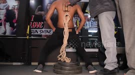 Indian man breaks records for lifting weights with just his shoulder blades