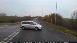 Reckless driver, Ford Galaxy pulls out straight in front of heavy truck, Islip, Northamptonshire.