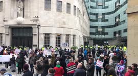 Thousands of NHS workers gather outside the BBC to oppose mandatory vaccination