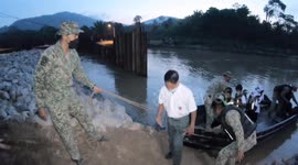 Army transports schoolchildren by boat due to destroyed road in Kampung Bemban, Malaysia