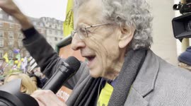 'take down the BBC!' Piers Corbyn led the chant outside the BBC office before the anti-vaccine march began