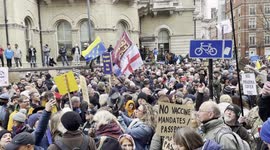 Thousands gather outside the BBC office for anti-vaccine protest