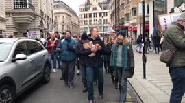 Protesters March from Piccadilly Circus down to Trafalgar Square marching against medical tyranny