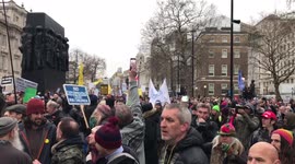 Anti mandate protesters outside walking down from Downing Street to Parliament square fo the world wide rally for freedom.