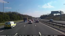 Dangerous driver - Tipper truck emergency braking and wheel lock up on M6 motorway near Manchester, UK