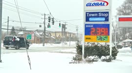 Post road wit traffic in Connecticut at winter storm 2021 near gas station