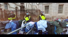 Anti vax NHS staff throw their scrubs at Downing Street