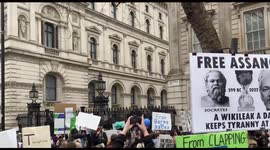 UK: Protesters Against Vaccine Mandate For NHS Staff Throwing Uniforms Outside Downing Street