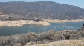 California extreme drought low water (Castaic Lake, pan left) V18962