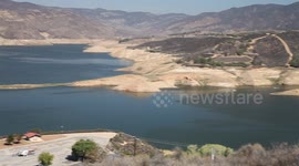 California extreme drought low water (Castaic Lake, pan left) V18963