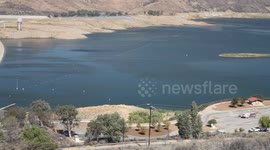 California extreme drought low water (Castaic Lake, pan left to dam) V18964