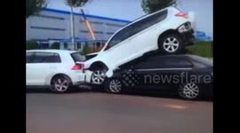 Truck smashes parked cars in China