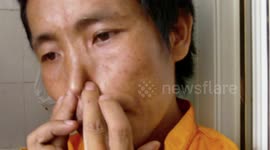 Man singing using his ears