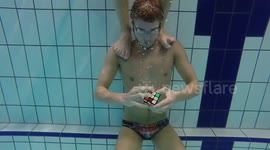 Man solves three Rubik's Cubes underwater in one breath