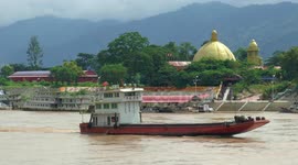 Chinese freighters at the Golden Triangle