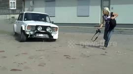 Rally car narrowly avoids crowd