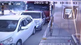 Truck smashes into end of queue of traffic in China