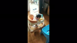 the baby fell asleep on the walker. really cute and funny video.