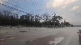 Ice blankets road after heavy hailstorm hits tropical northern Thailand