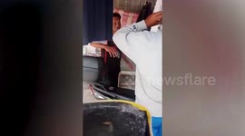 Father breaks into dance after finally securing Japan visa to reunite with family