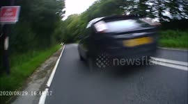 Cyclist close passed and hit by Black Ford Focus car on East Chevin Road Otley West Yorkshire