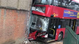 Children among 19 injured when bus crashes into London shop