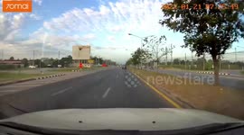 Mango flies from truck and splatters into car travelling behind