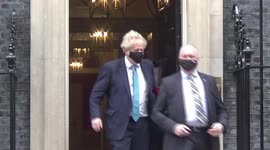 Embattled UK PM Boris Johnson leaves 10 Downing Street ahead of PMQs