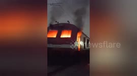 Train set alight during railway protest in northern India