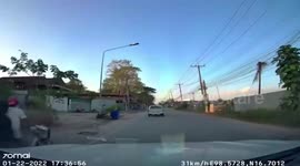 Quick-thinking driver dodges toddler running into road in Thailand