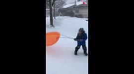 'Minnesota kid's EPIC sledding fail amid severe winter storm is MUST-WATCH '