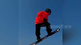 This talented snowboarder still glides down the slopes despite being in his 60s