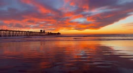 Experience this stunning Californian sunset as the sun dips below the Pacific