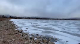 Cold weather freezes Colorado lake