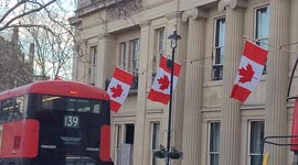 Anti-vax band play outside London's Canadian embassy in support of trucker protests