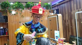Hairdressers From Xi'An, China Wear Ancient Clothes And Cut Hair