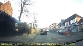 Mother and child narrowly escape being hit after speeding car jumps red light