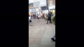 People walk by and passers-by on Market Street, central Manchester, Greater Manchester, United Kingdom, British Isles.