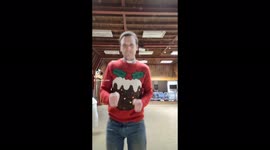 Priest in Christmas jumper does cheesy dance in church