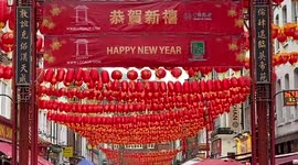 Lanterns and ‘Happy New Year’ signs decorate Chinatown in London