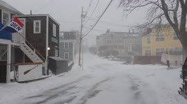 Storm conditions in Massachusetts as blizzard blankets area with snow