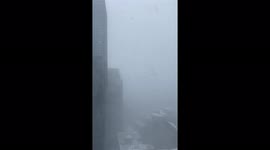 Winter Storm Kenan: Gusts of wind and snow seen from 37th floor of Boston building